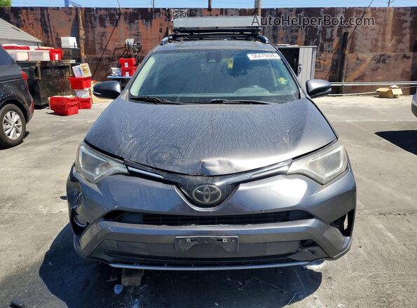 JTMWFREV5JJ728359 2018 TOYOTA RAV4 Black წინა ხედი