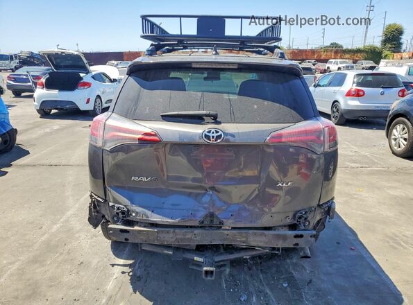 JTMWFREV5JJ728359 2018 TOYOTA RAV4 Black უკანა ხედი