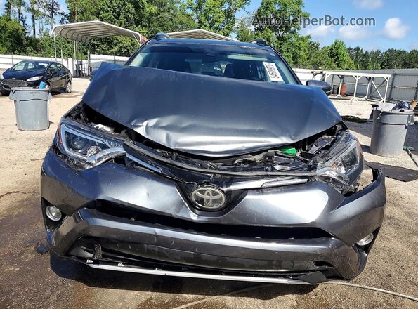 JTMWFREV6HD099669 2017 TOYOTA RAV4 Gray Widok z przodu