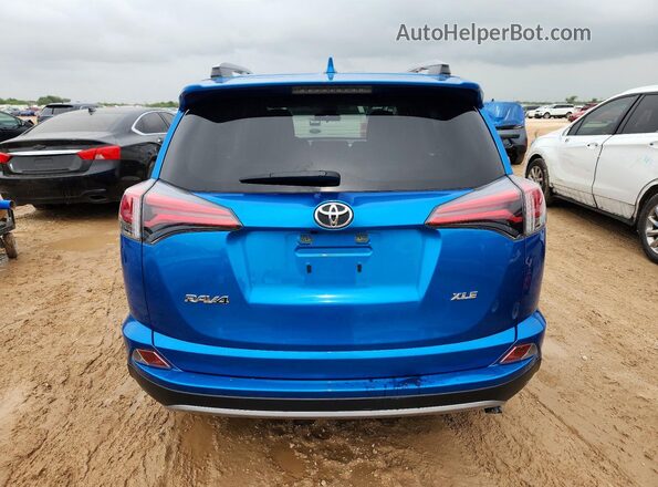 JTMWFREV6HJ147964 2017 TOYOTA RAV4 Blue უკანა ხედი
