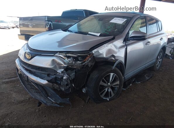 JTMWFREV6JJ173891 2018 TOYOTA RAV4 Silver წინა მარცხენა ხედი სამი მეოთხედიდან