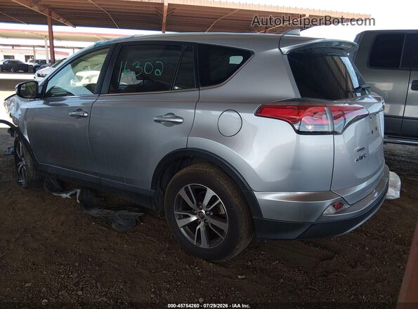 JTMWFREV6JJ173891 2018 TOYOTA RAV4 Silver უკანა მარცხენა