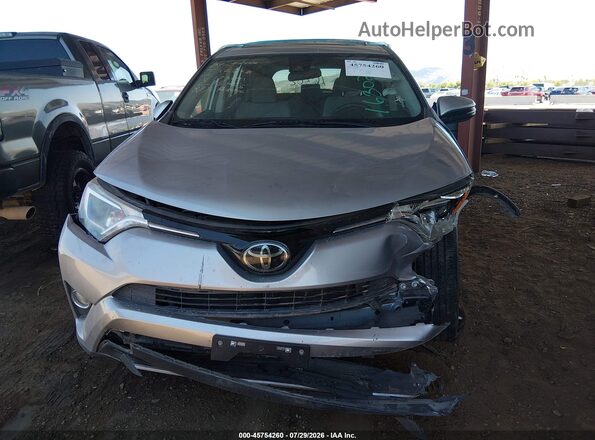 JTMWFREV6JJ173891 2018 TOYOTA RAV4 Silver წინა ხედი