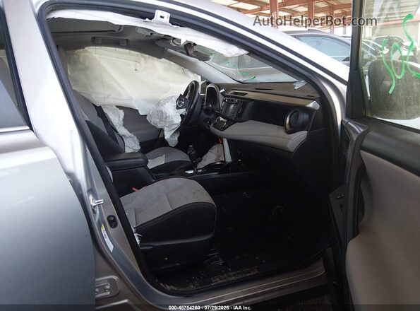 JTMWFREV6JJ173891 2018 TOYOTA RAV4 Silver წინა სალონის ხედი