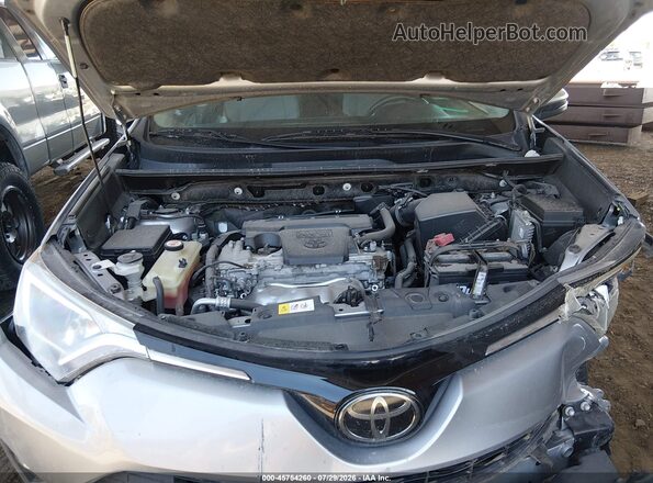 JTMWFREV6JJ173891 2018 TOYOTA RAV4 Silver უკანა ხედი