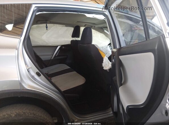 JTMWFREV6JJ173891 2018 TOYOTA RAV4 Silver VIN კოდის სტიკერის ხედი