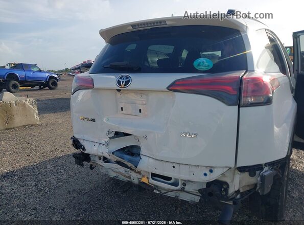 JTMWFREV6JJ192179 2018 TOYOTA RAV4 White Front view