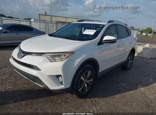 JTMWFREV6JJ192179 2018 TOYOTA RAV4 White Front left