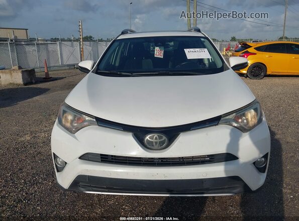 JTMWFREV6JJ192179 2018 TOYOTA RAV4 White Rear interior view