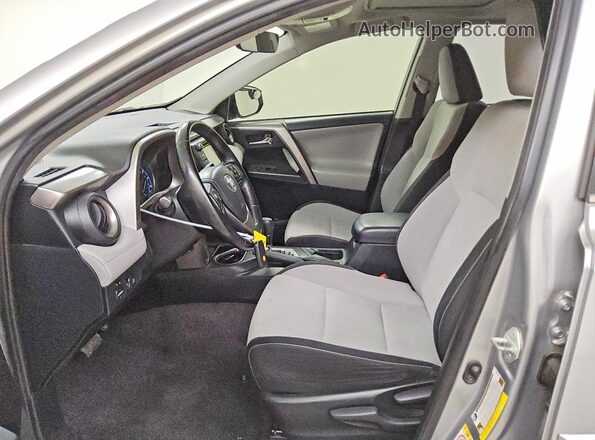 JTMWFREV6JJ194806 2018 TOYOTA RAV4 Gray წინა სალონის ხედი
