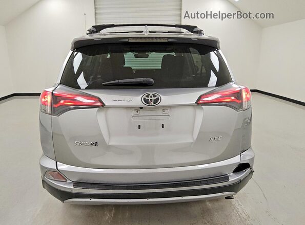 JTMWFREV6JJ194806 2018 TOYOTA RAV4 Gray უკანა ხედი