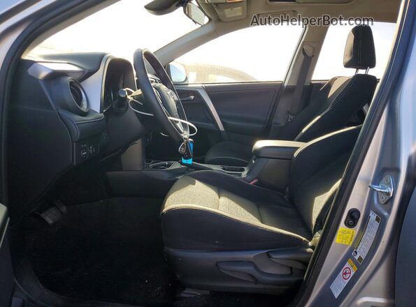 JTMWFREV6JJ200300 2018 TOYOTA RAV4 Silver Вид салону спереду
