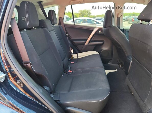 JTMWFREV7HD093220 2017 TOYOTA RAV4 Blue Widok wnętrza z tyłu