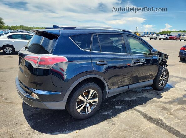 JTMWFREV7HD093220 2017 TOYOTA RAV4 Blue Tył prawy