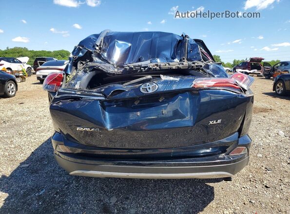 JTMWFREV7HJ713999 2017 TOYOTA RAV4 Black უკანა ხედი