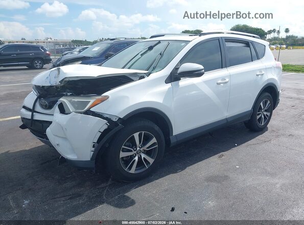 JTMWFREV7JJ200757 2018 TOYOTA RAV4 White Front left