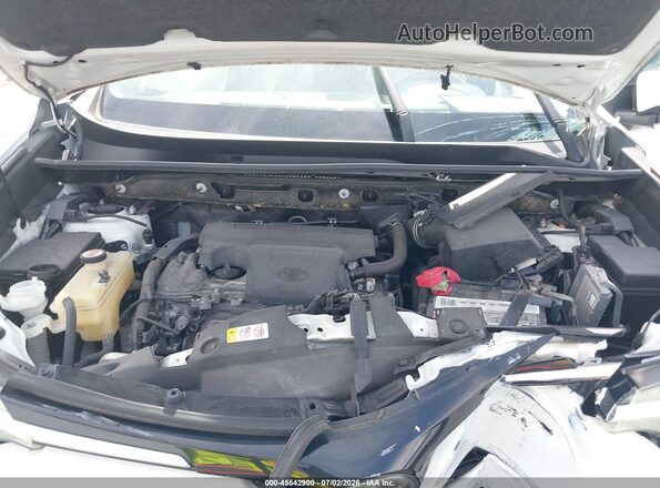 JTMWFREV7JJ200757 2018 TOYOTA RAV4 White Rear view