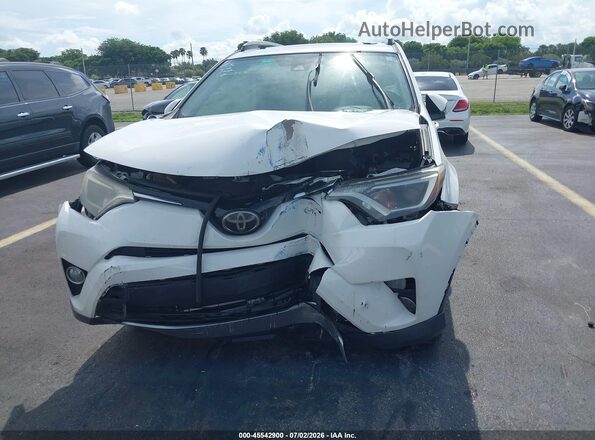 JTMWFREV7JJ200757 2018 TOYOTA RAV4 White Front view