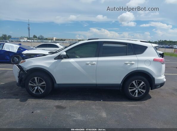 JTMWFREV7JJ200757 2018 TOYOTA RAV4 White Rear interior view