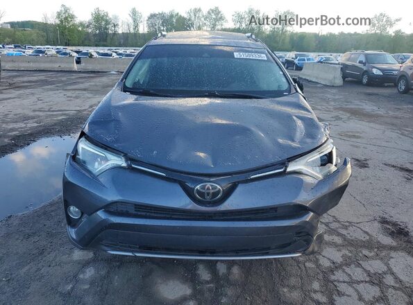 JTMWFREV7JJ208695 2018 TOYOTA RAV4 Gray Vista frontal