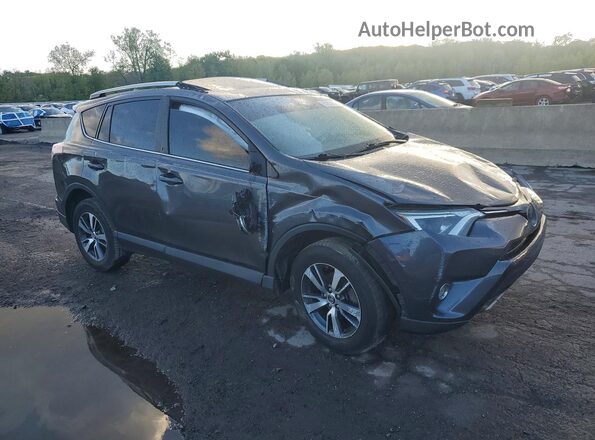 JTMWFREV7JJ208695 2018 TOYOTA RAV4 Gray Delantero derecho