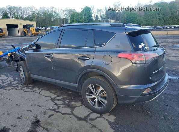 JTMWFREV7JJ208695 2018 TOYOTA RAV4 Gray Trasero izquierdo
