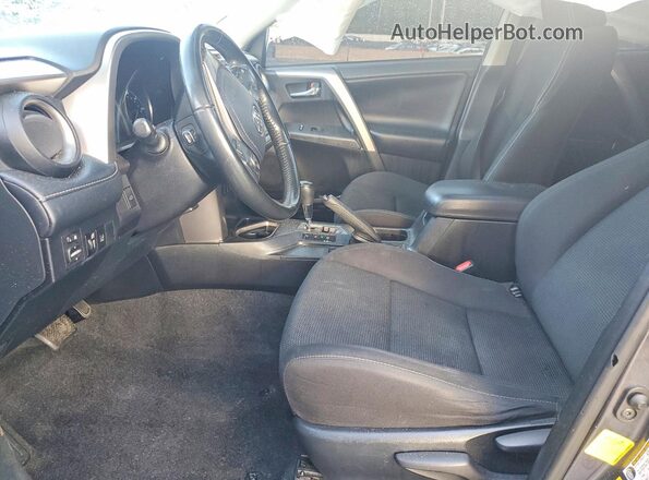 JTMWFREV7JJ208695 2018 TOYOTA RAV4 Gray Vista interior delantera