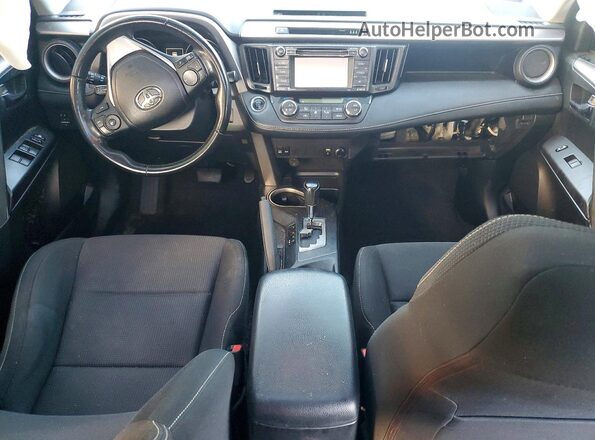 JTMWFREV7JJ208695 2018 TOYOTA RAV4 Gray Vista del salpicadero