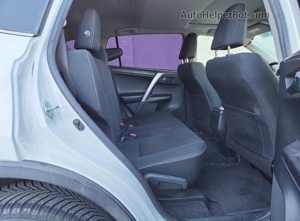 JTMWFREV7JJ732171 2018 TOYOTA RAV4 White Widok wnętrza z tyłu