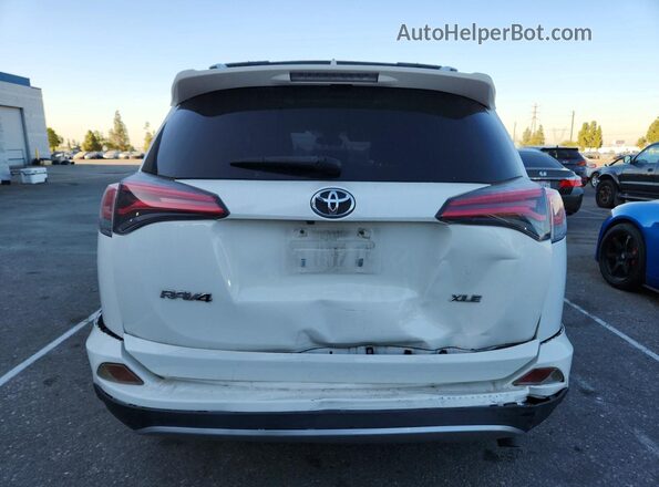 JTMWFREV7JJ732171 2018 TOYOTA RAV4 White Widok z tyłu
