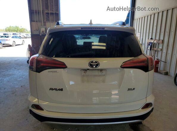 JTMWFREV8GJ097986 2016 TOYOTA RAV4 White Հետևի տեսք
