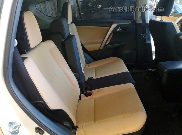 JTMWFREV8GJ097986 2016 TOYOTA RAV4 White Սալոնի հետևի տեսք