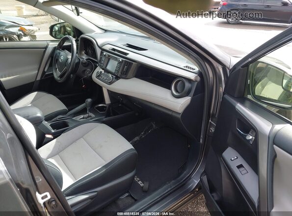 JTMWFREV8HJ101309 2017 TOYOTA RAV4 Gray წინა სალონის ხედი