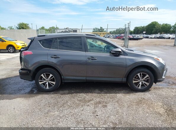 JTMWFREV8HJ101309 2017 TOYOTA RAV4 Gray უკანა სალონის ხედი