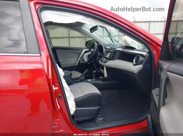 JTMWFREV8HJ105943 2017 TOYOTA RAV4 Red Widok wnętrza z przodu