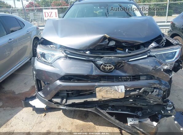 JTMWFREV8HJ706382 2017 TOYOTA RAV4 Gray Вид спереду