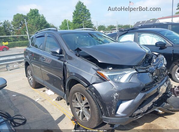 JTMWFREV8HJ706382 2017 TOYOTA RAV4 Gray Вид задньої частини салону