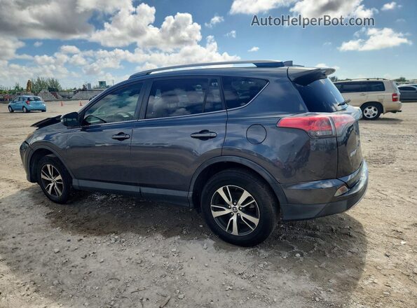 JTMWFREV8JD132354 2018 TOYOTA RAV4 Black Հետևի ձախ