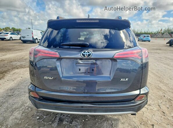 JTMWFREV8JD132354 2018 TOYOTA RAV4 Black Հետևի տեսք