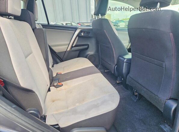 JTMWFREV8JD132354 2018 TOYOTA RAV4 Black Հետևի նստատեղերի տեսք