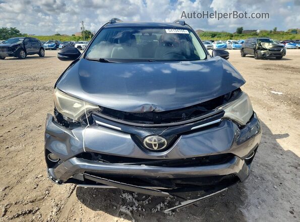 JTMWFREV8JD132354 2018 TOYOTA RAV4 Black Դիմացի տեսք