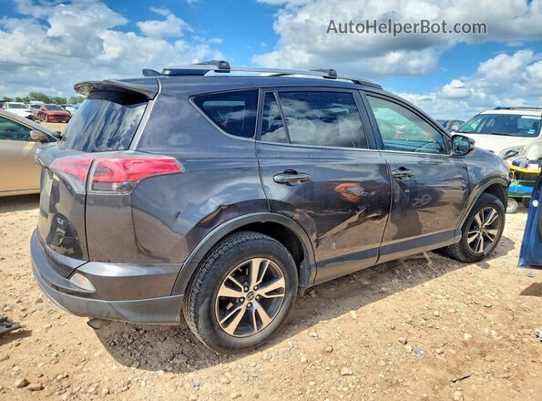 JTMWFREV8JJ728372 2018 TOYOTA RAV4 Gray Trasero derecho