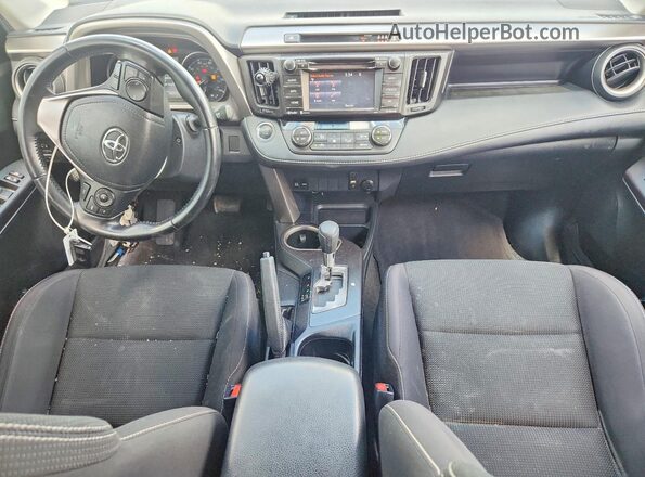 JTMWFREV8JJ728372 2018 TOYOTA RAV4 Gray Vista del salpicadero