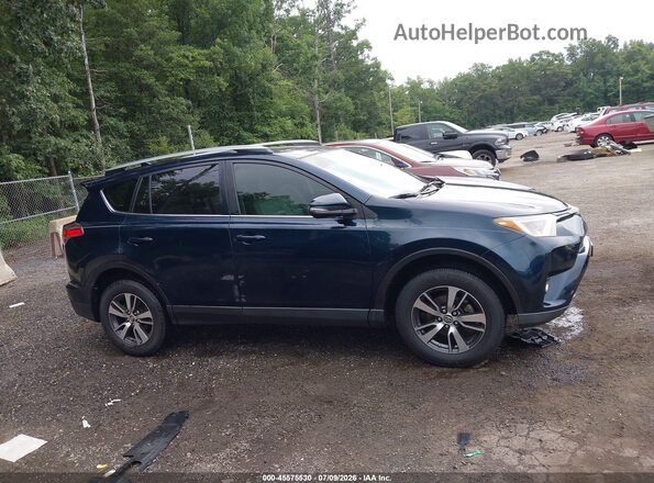 JTMWFREV8JJ732910 2018 TOYOTA RAV4 Blue Вид задньої частини салону