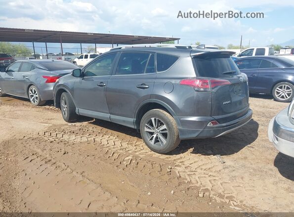 JTMWFREV9GJ084132 2016 TOYOTA RAV4 Gray Հետևի ձախ