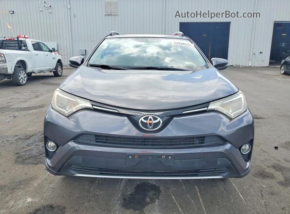JTMWFREV9GJ091405 2016 TOYOTA RAV4 Gray Դիմացի տեսք