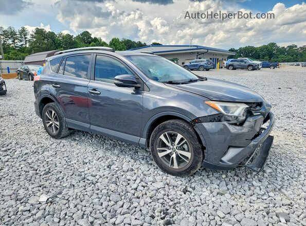 JTMWFREV9HD094689 2017 TOYOTA RAV4 Gray Front right