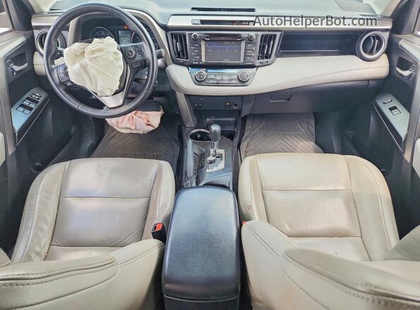 JTMWFREV9HD094689 2017 TOYOTA RAV4 Gray Dashboard view
