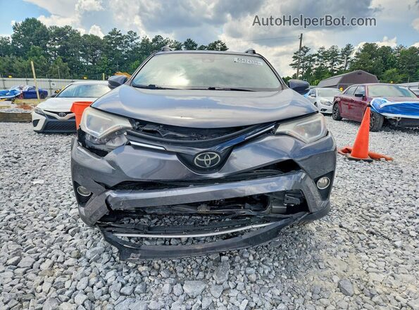 JTMWFREV9HD094689 2017 TOYOTA RAV4 Gray Front view