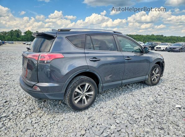JTMWFREV9HD094689 2017 TOYOTA RAV4 Gray Rear right